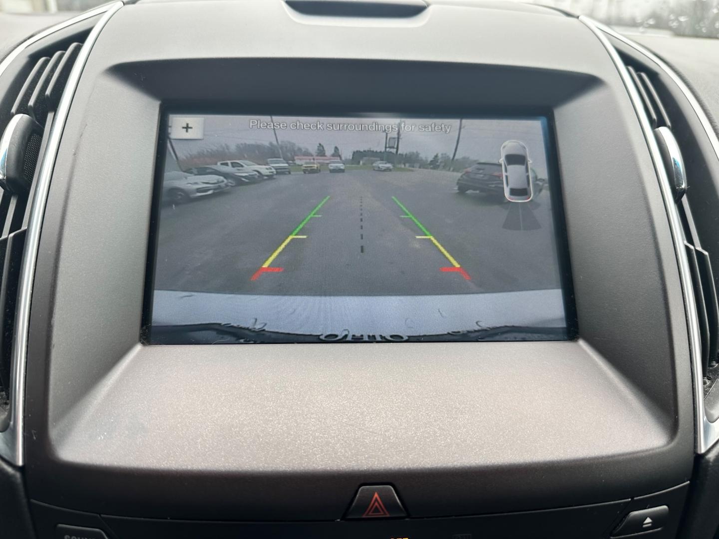2017 Silver /Black Ford Edge Titanium (2FMPK4K92HB) with an 2.0L I4 DOHC 16V Turbo engine, 6-Speed Automatic transmission, located at 547 E. Main St., Orwell, OH, 44076, (440) 437-5893, 41.535435, -80.847855 - This 2017 Ford Edge Titanium AWD is a well-equipped midsize SUV. It comes with a powerful yet efficient 2.0L EcoBoost engine paired with a smooth 6-speed automatic transmission. Notable features include LED daytime running lights, dusk-sensing headlights, leather interior, auto-dimming rearview mirr - Photo#27